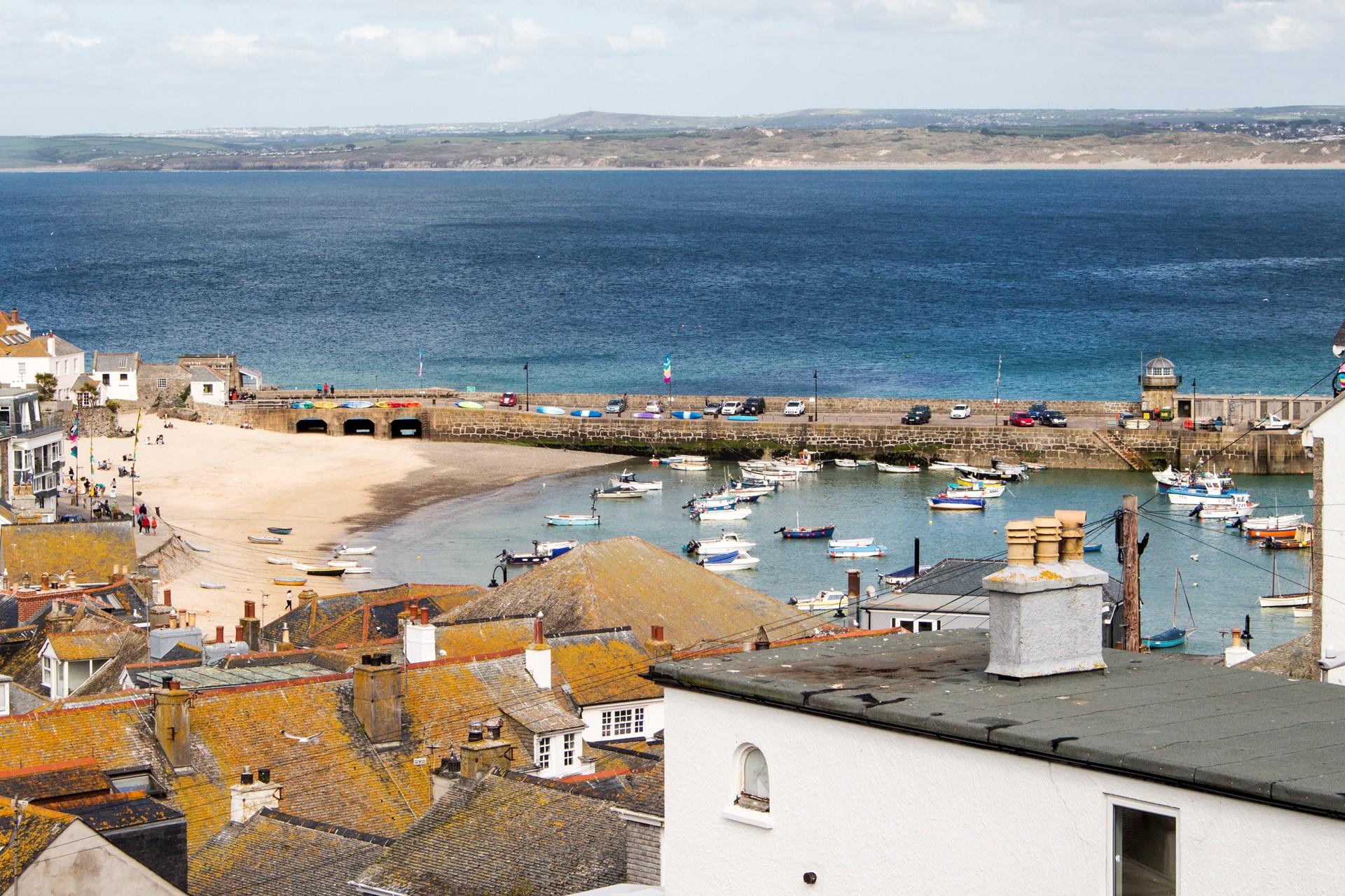 Watch the boats bobbing on the water in the harbour when the tides in.