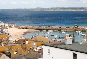 Watch the boats bobbing on the water in the harbour when the tides in.