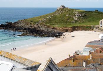 Porthmeor Beach is just steps away for beach days.