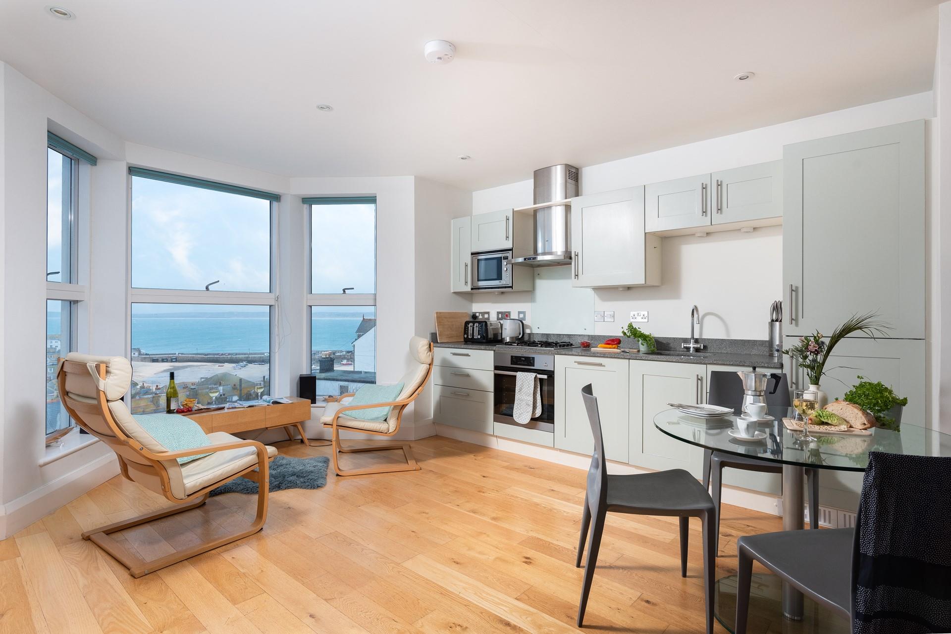 Open a bottle of wine and take in the views while the sun goes down.