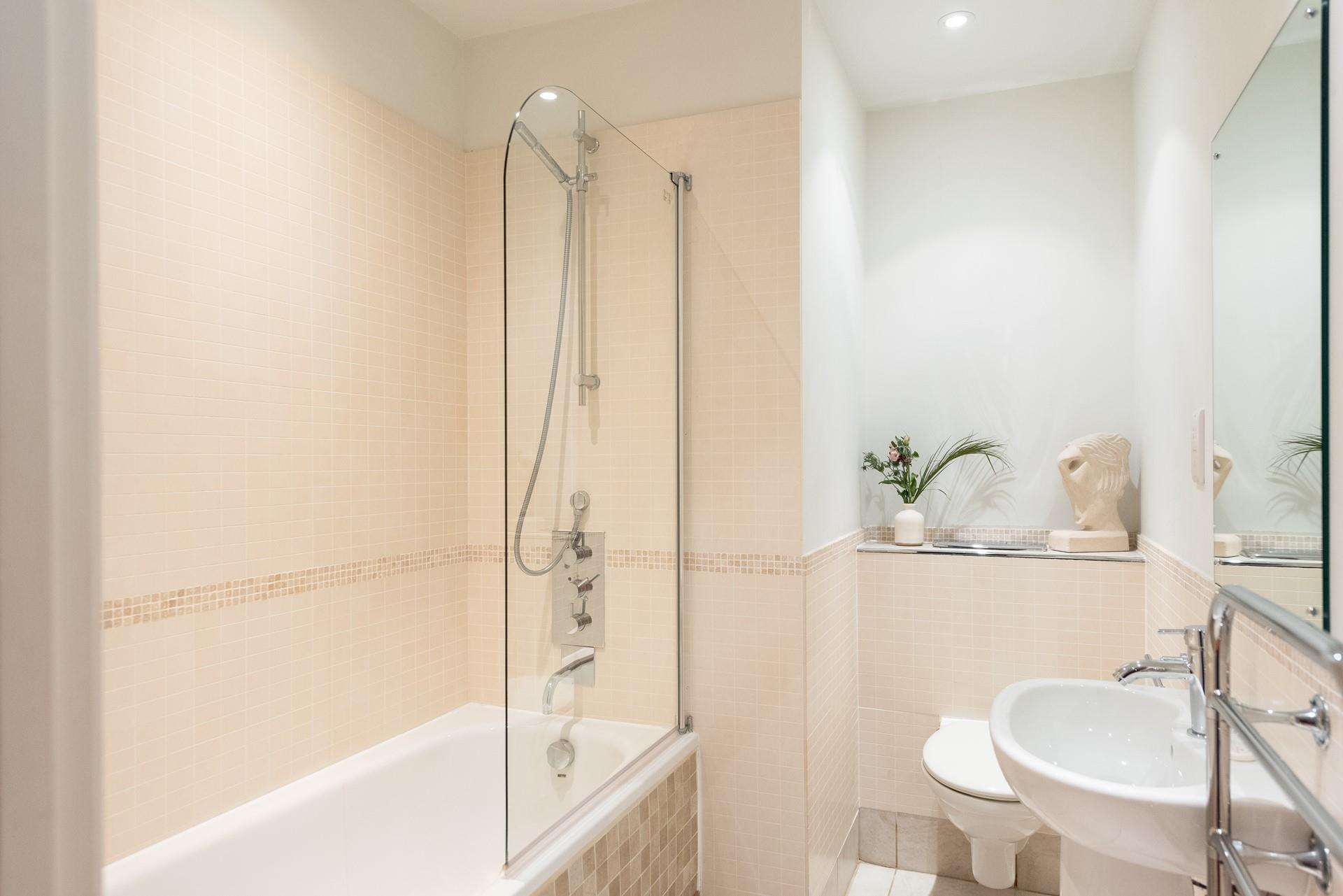 The family bathroom has a bath or shower to choose from.