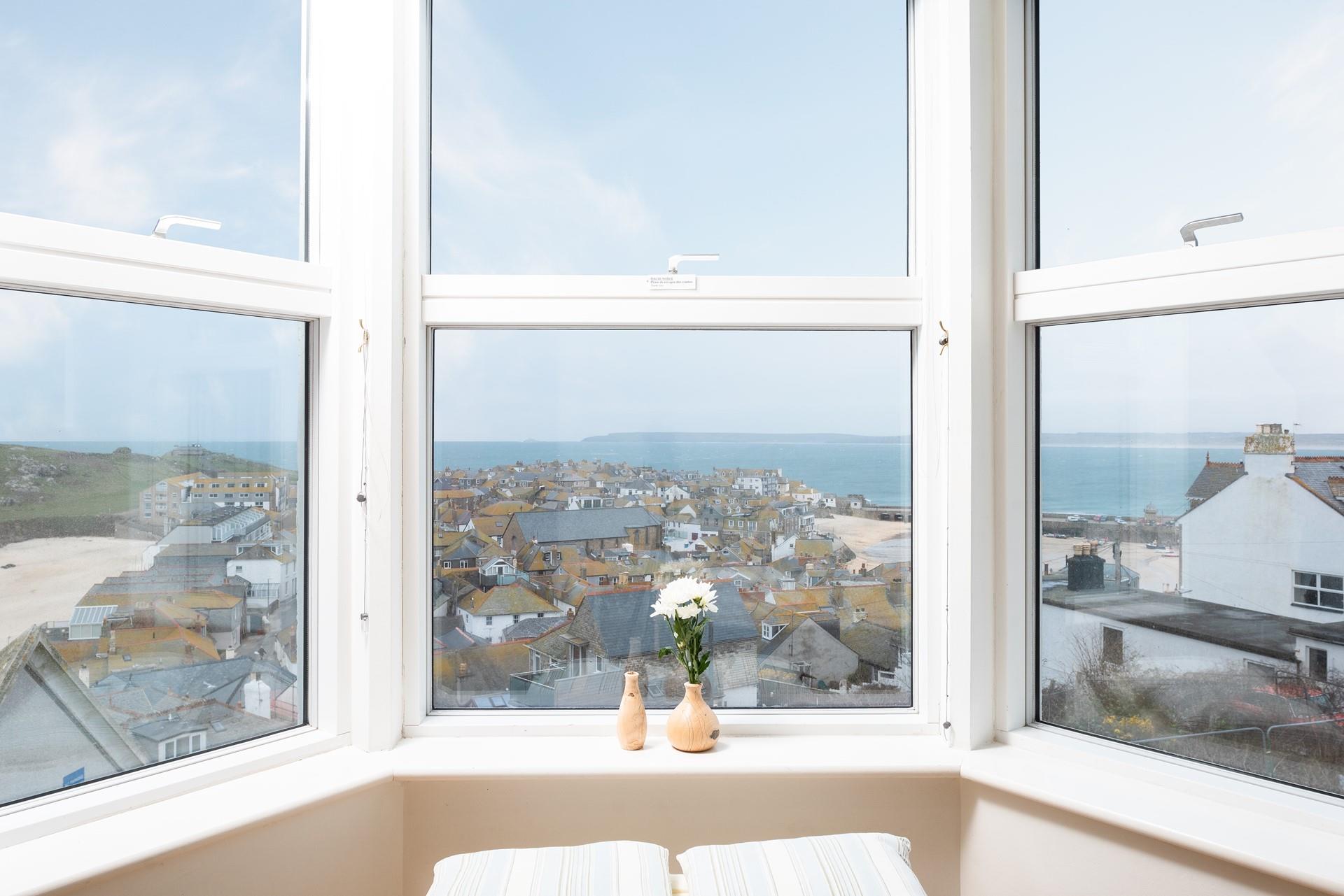 The window seat is the perfect spot to get stuck into a good book.