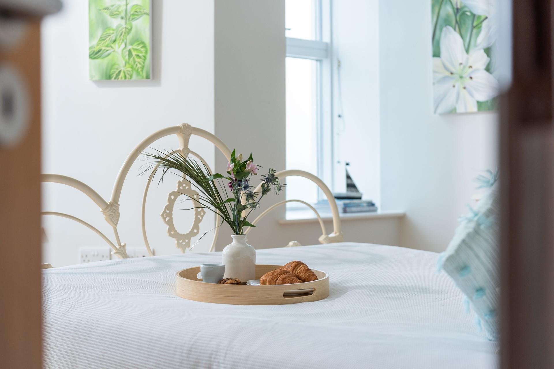 Relax and enjoy breakfast in bed with a stunning view.