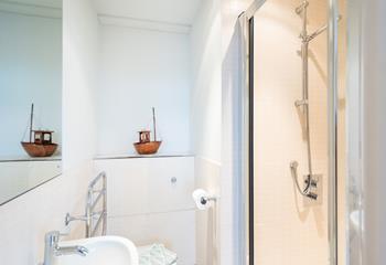 Wash off sandy toes in the en suite shower room.