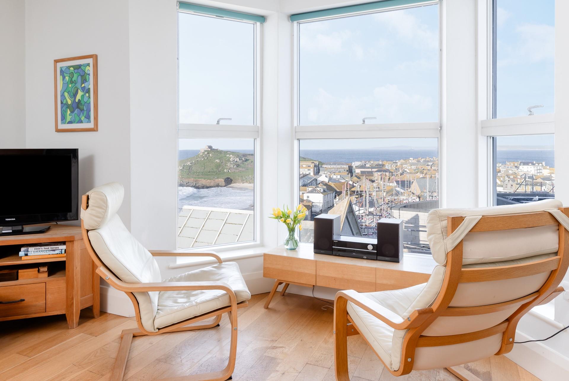 Sit by the window and watch the waves roll in.