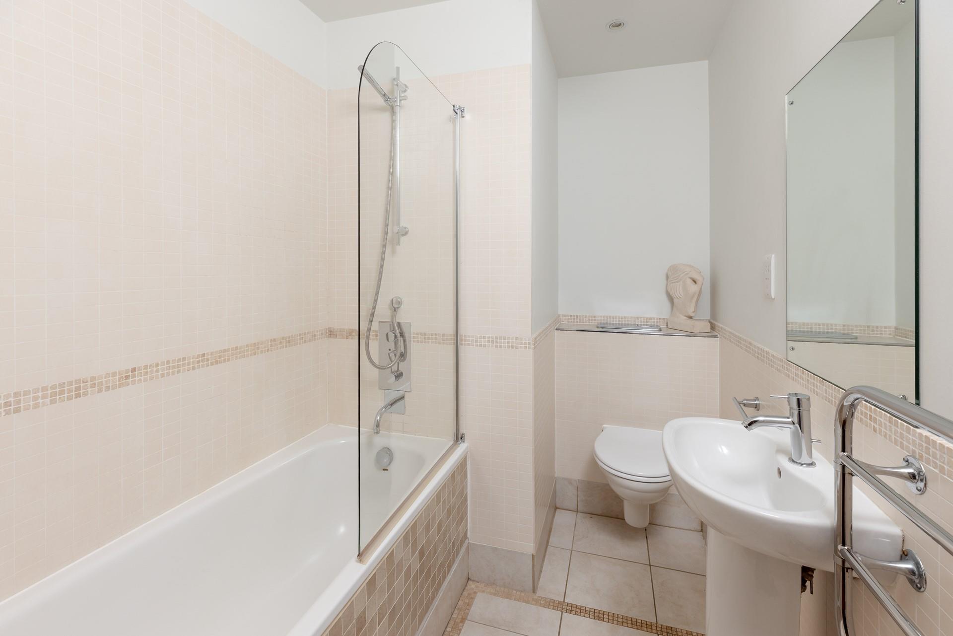 Soak in the tub or have an invigorating shower in the family bathroom. 