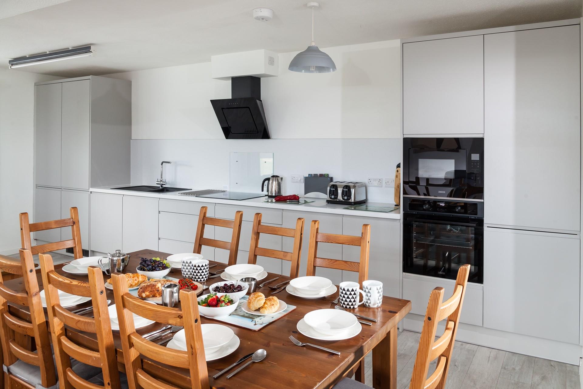 The modern well-equipped kitchen is perfect for the chef of the family to cook up a storm.