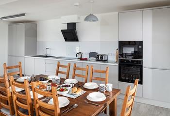 The modern well-equipped kitchen is perfect for the chef of the family to cook up a storm.