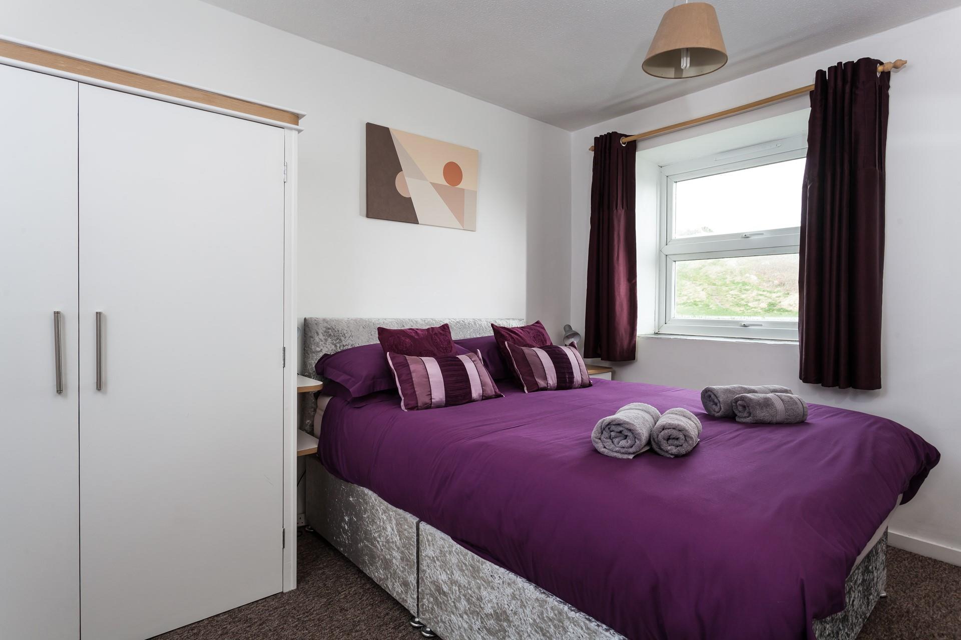 Climb into the spacious king size bed and drift off for a dreamy night's sleep.