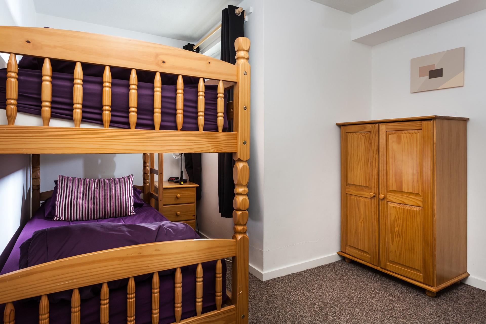 All the bedrooms have a deep purple theme which provides a pop of colour.