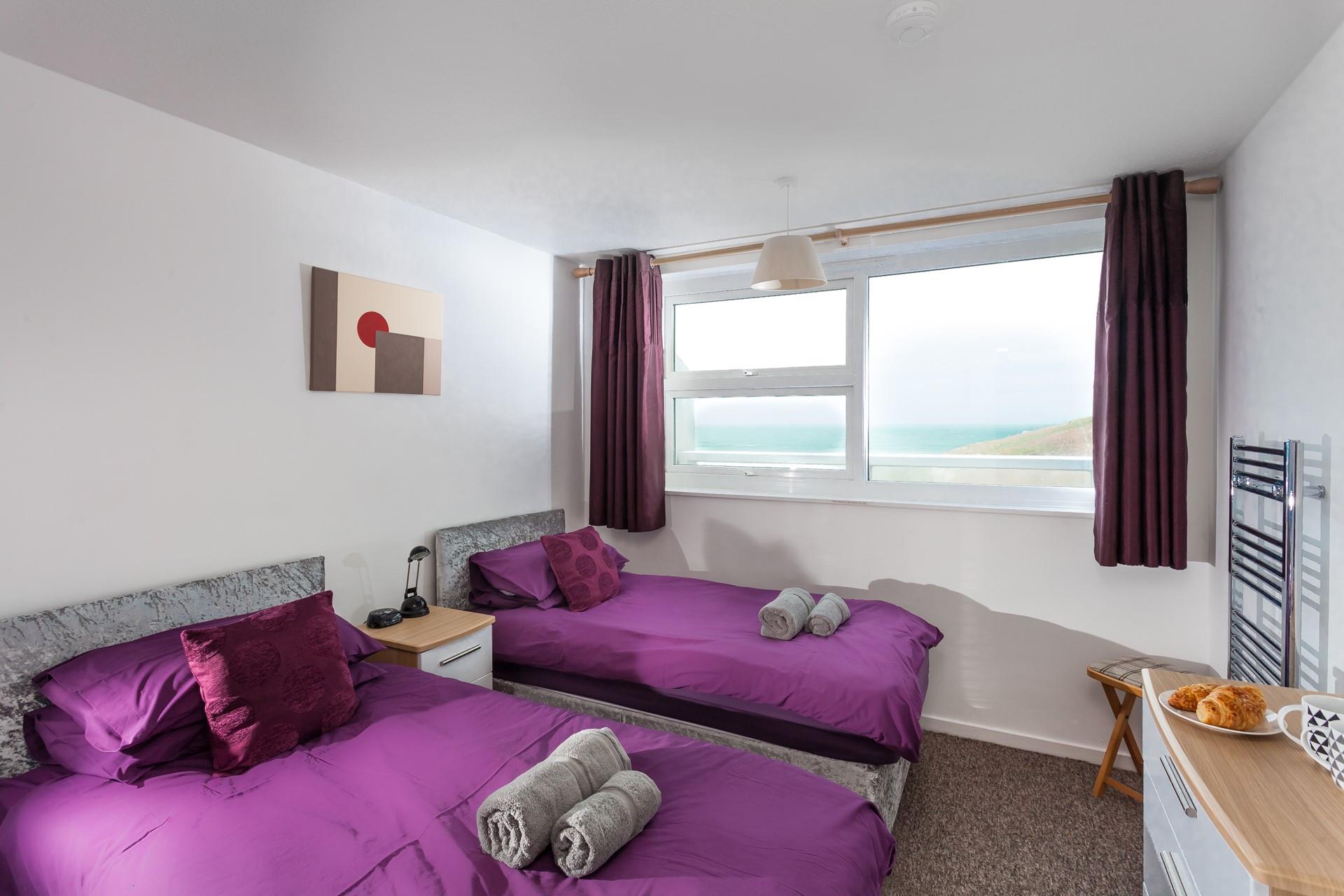 Sip your morning cuppa whilst looking out at the early morning surfers.