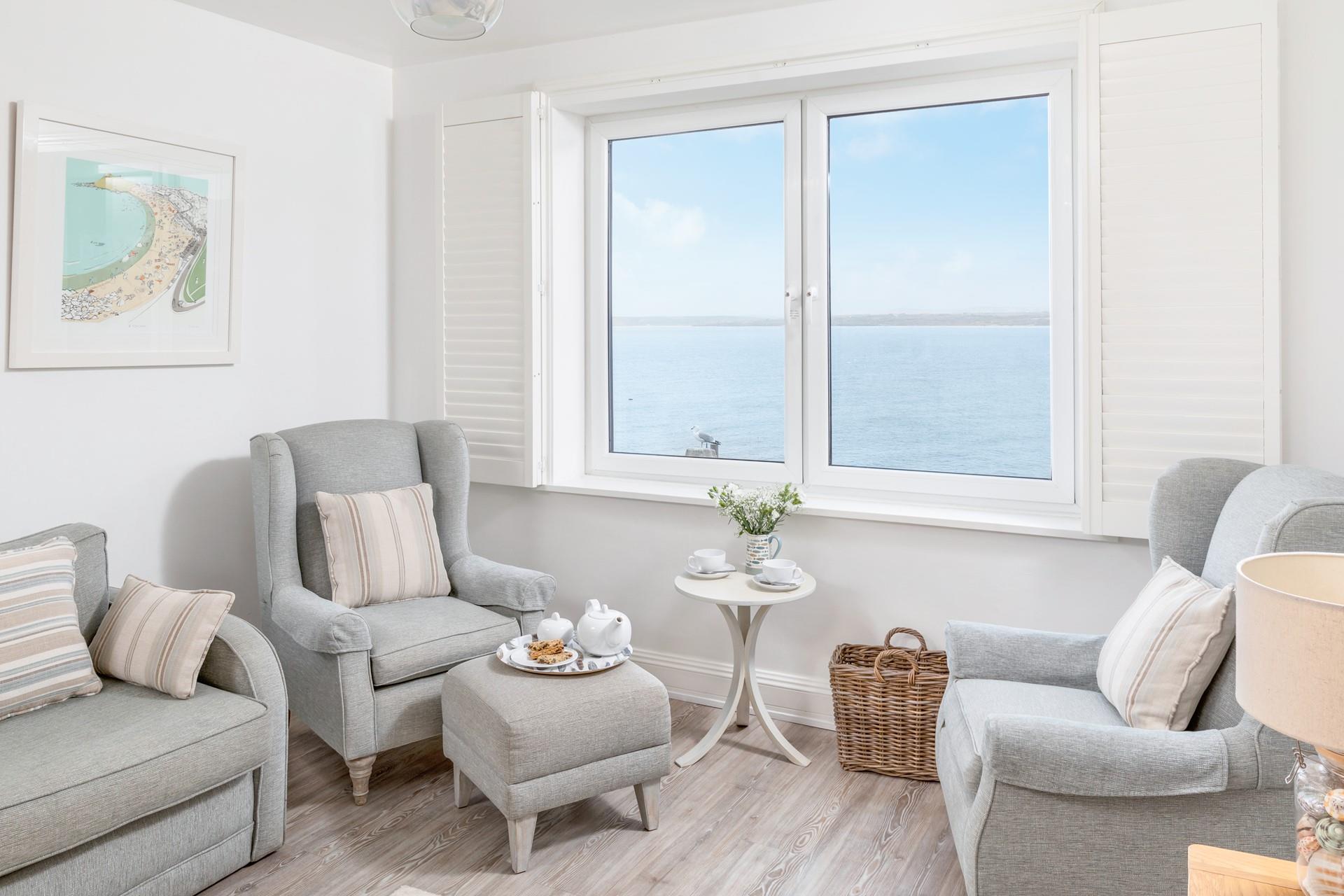 Soft, earthy tones invite you to relax and indulge in some quiet reading or a film together.