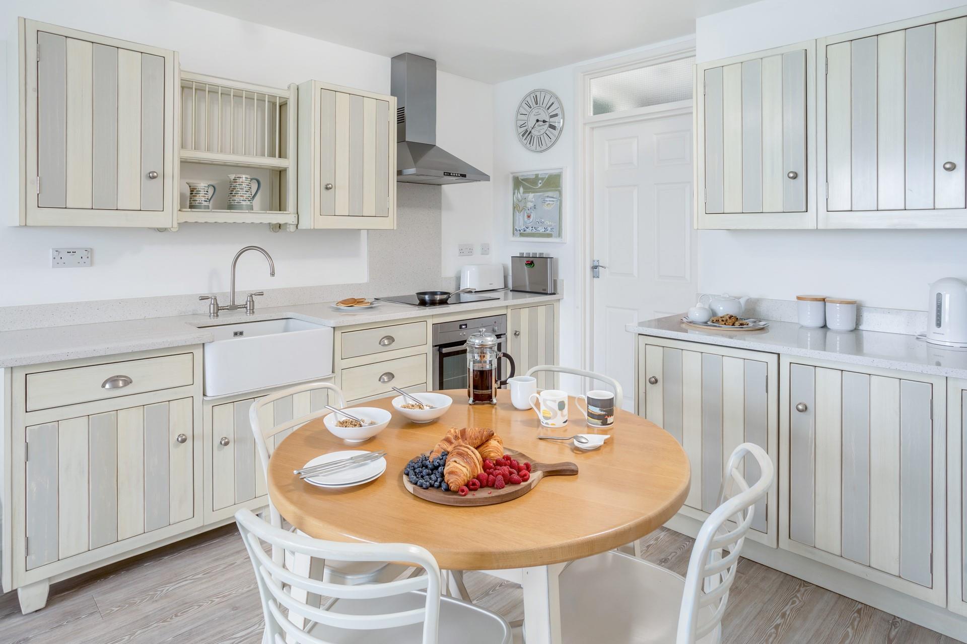 Though compact, the kitchen is fabulously well-equipped and makes cooking a breeze.