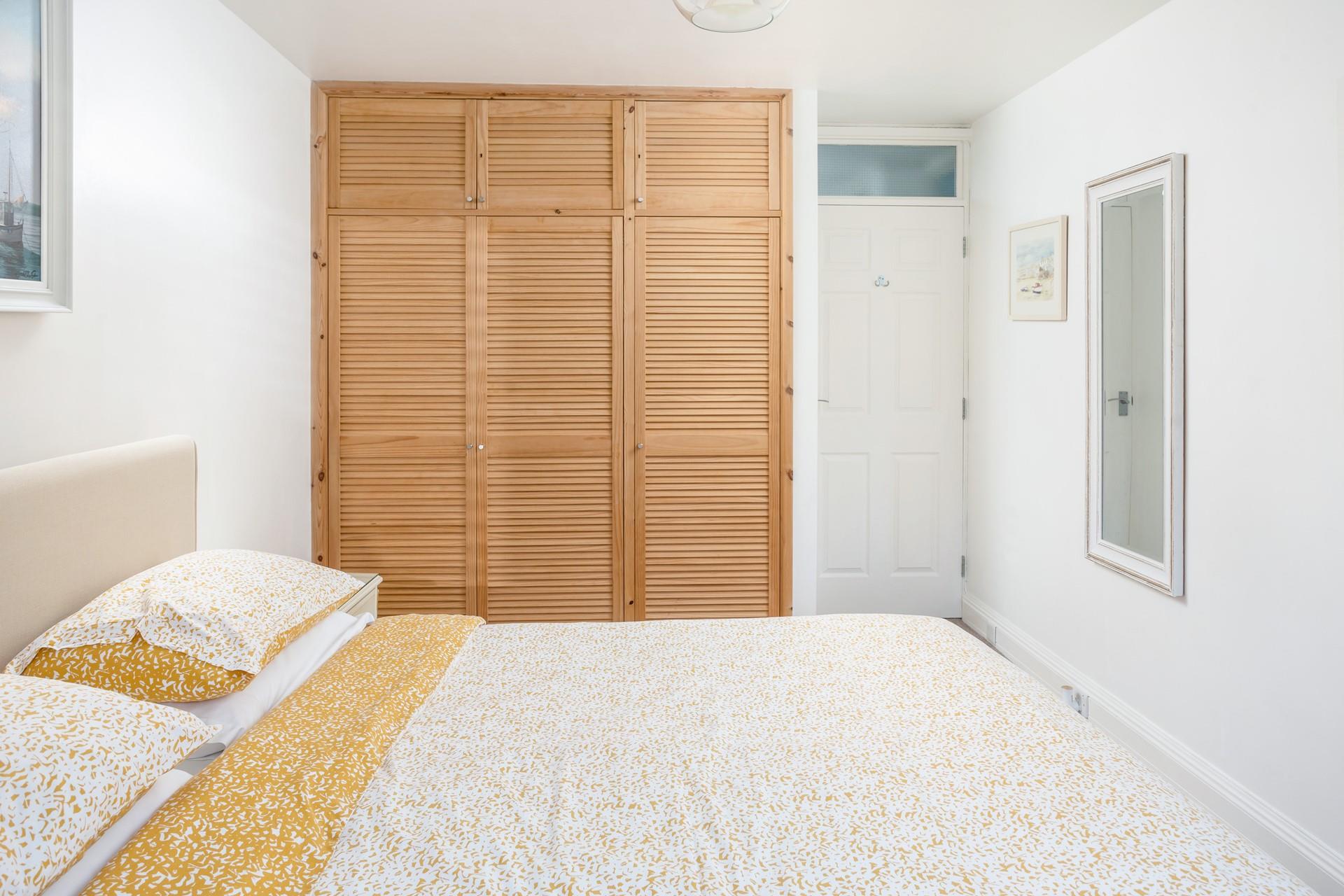 Enjoy a quiet bedroom read before snuggling down in the cosy bed.