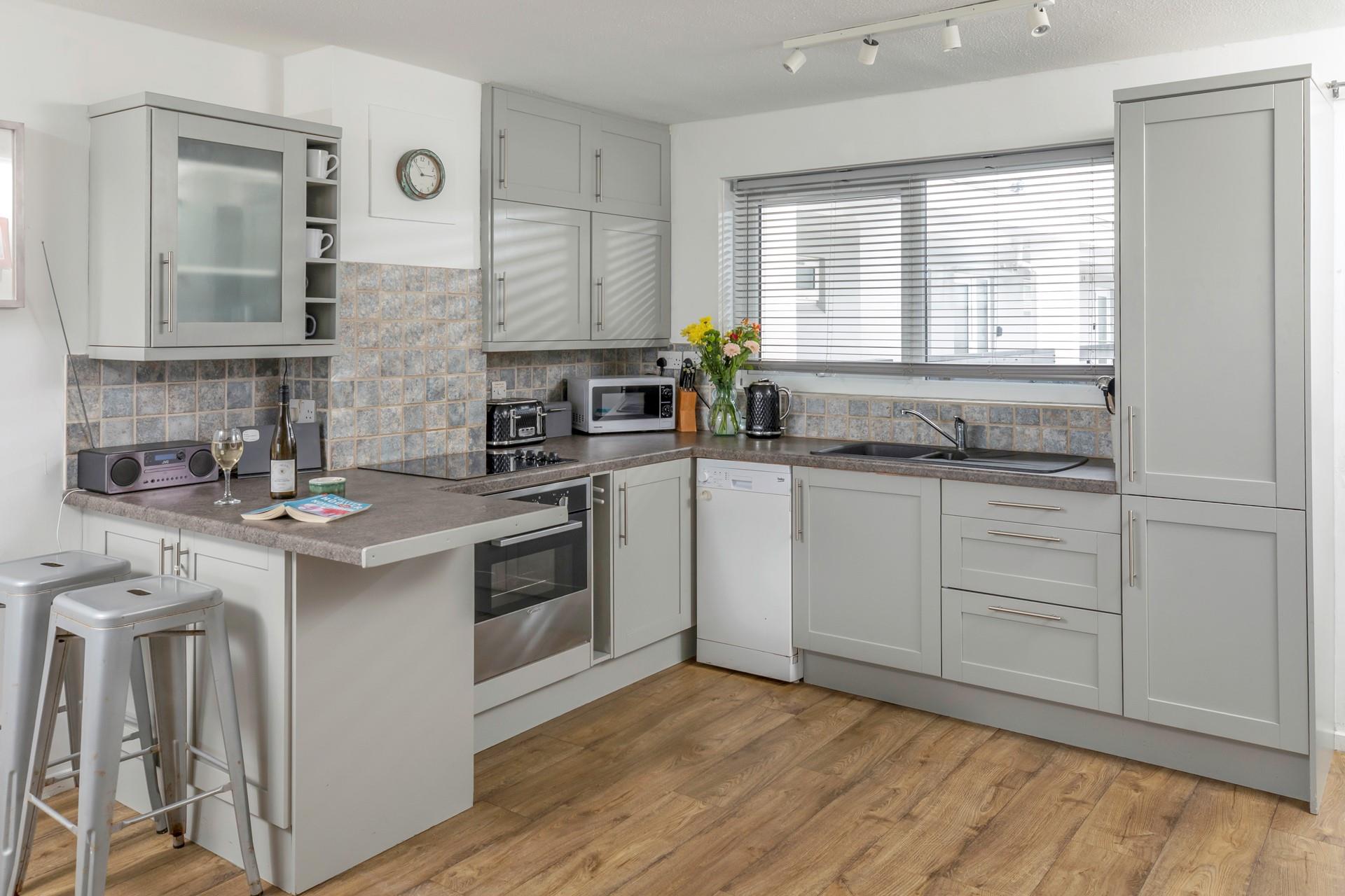 The kitchen is well-equipped for rustling up family meals, or if you don't feel like cooking you could head out for some fine dining.