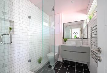 The modern and sleek shower room is perfect for an invigorating wake-up.