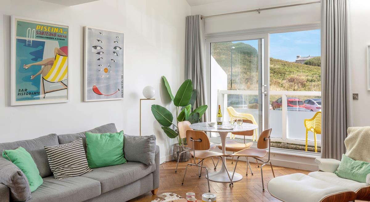 Pour yourself a glass of wine, sink into the plush grey sofa and let your holiday begin.