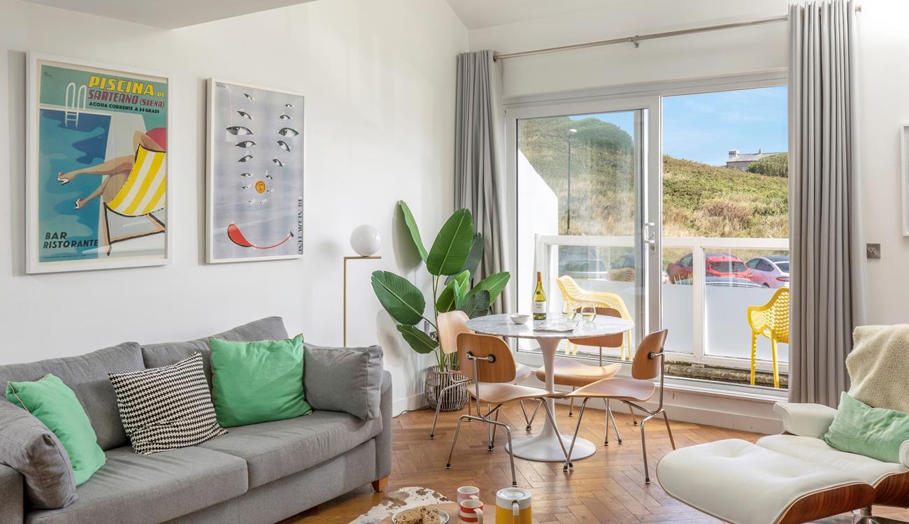 Pour yourself a glass of wine, sink into the plush grey sofa and let your holiday begin.