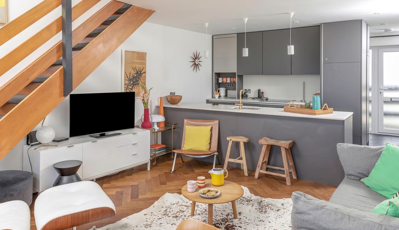 The open plan layout means you can cook, dine, and unwind together.