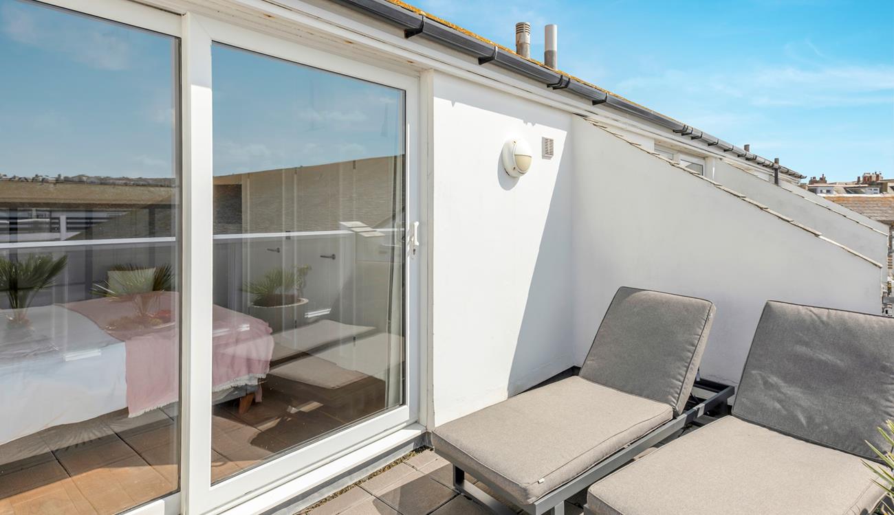 Grab a good book and while away the hours on the balcony.