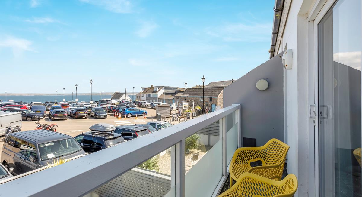 From the living area, the front balcony has sea views.