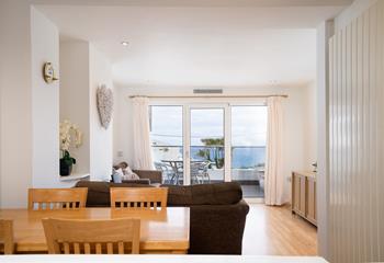 Bright and airy, the open plan living area offers a fabulous place to relax and socialise. 