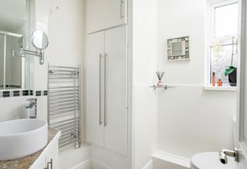 The bathroom has a lovely design with modern fixtures and fittings.
