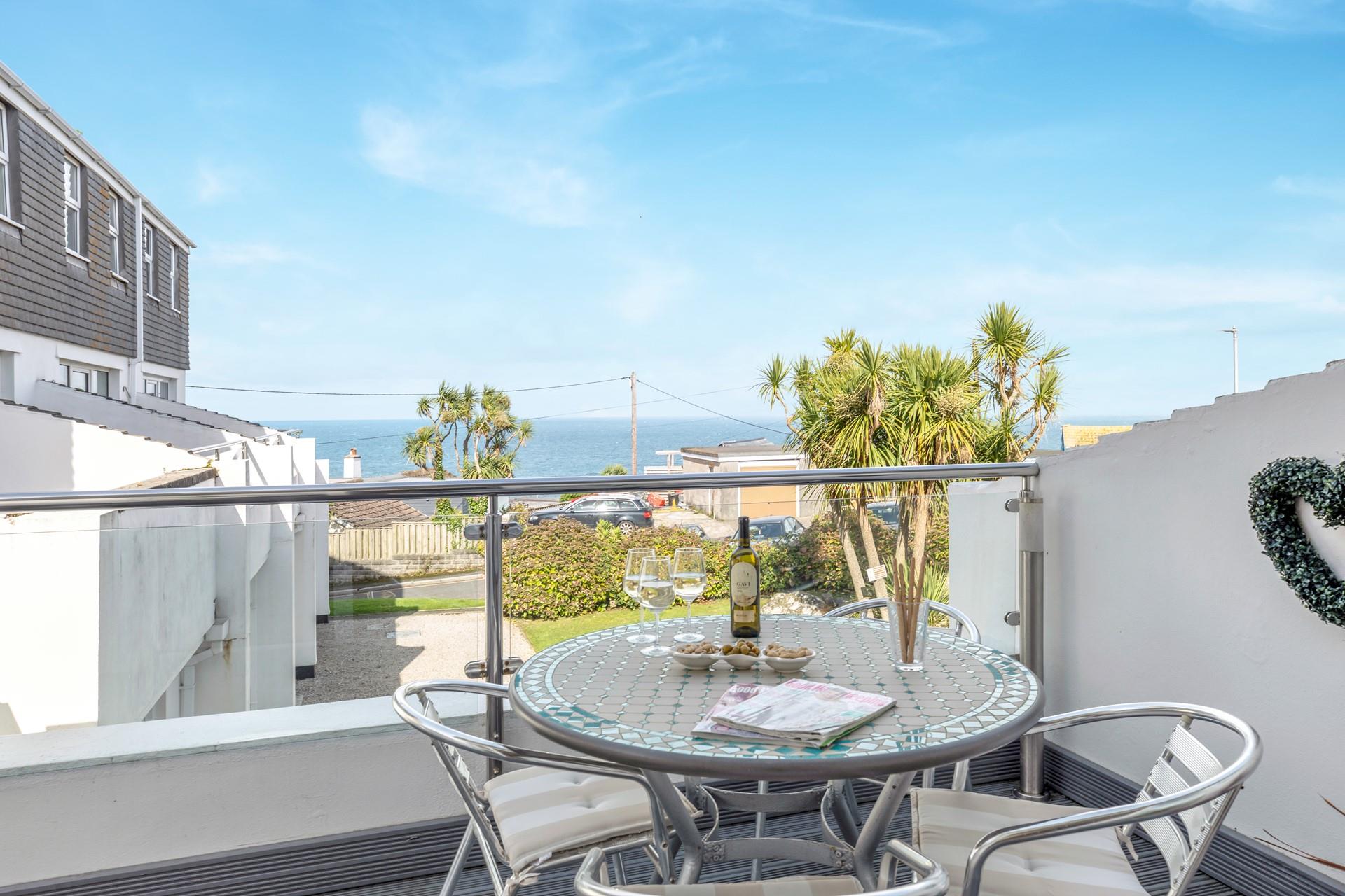 Enjoy beautiful sea views from the private balcony.