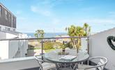 Enjoy beautiful sea views from the private balcony. - Thumbnail Image
