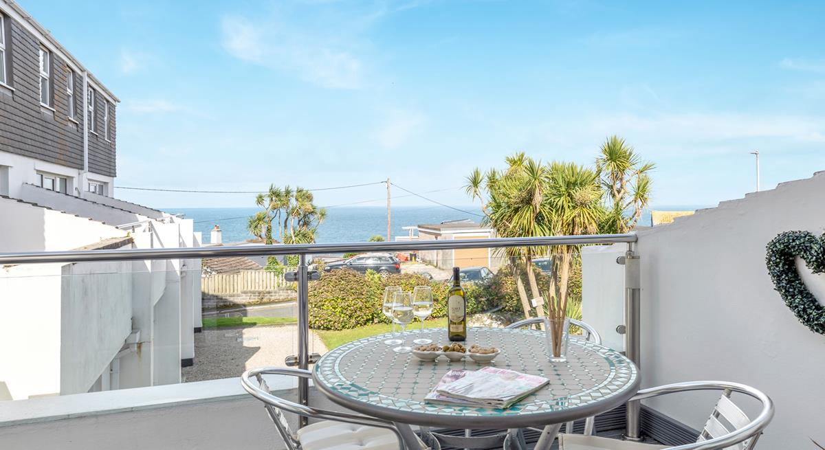 Enjoy beautiful sea views from the private balcony.