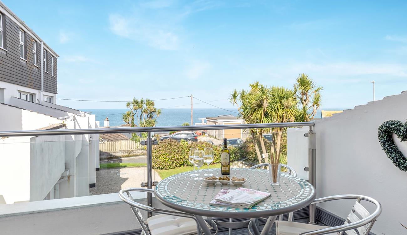 Enjoy beautiful sea views from the private balcony.