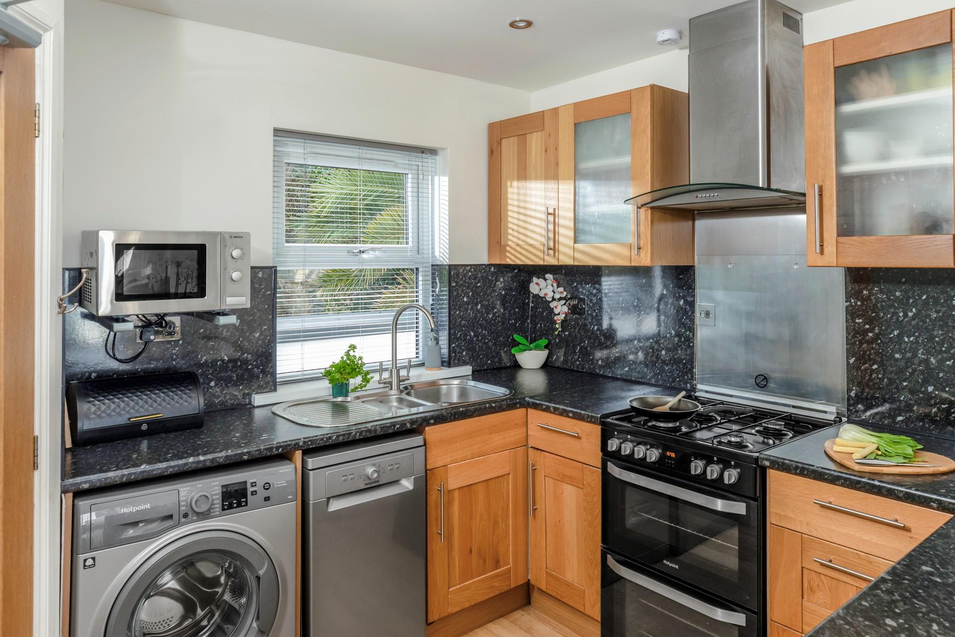 You'll find modern amenities in the kitchen, including a dishwasher!