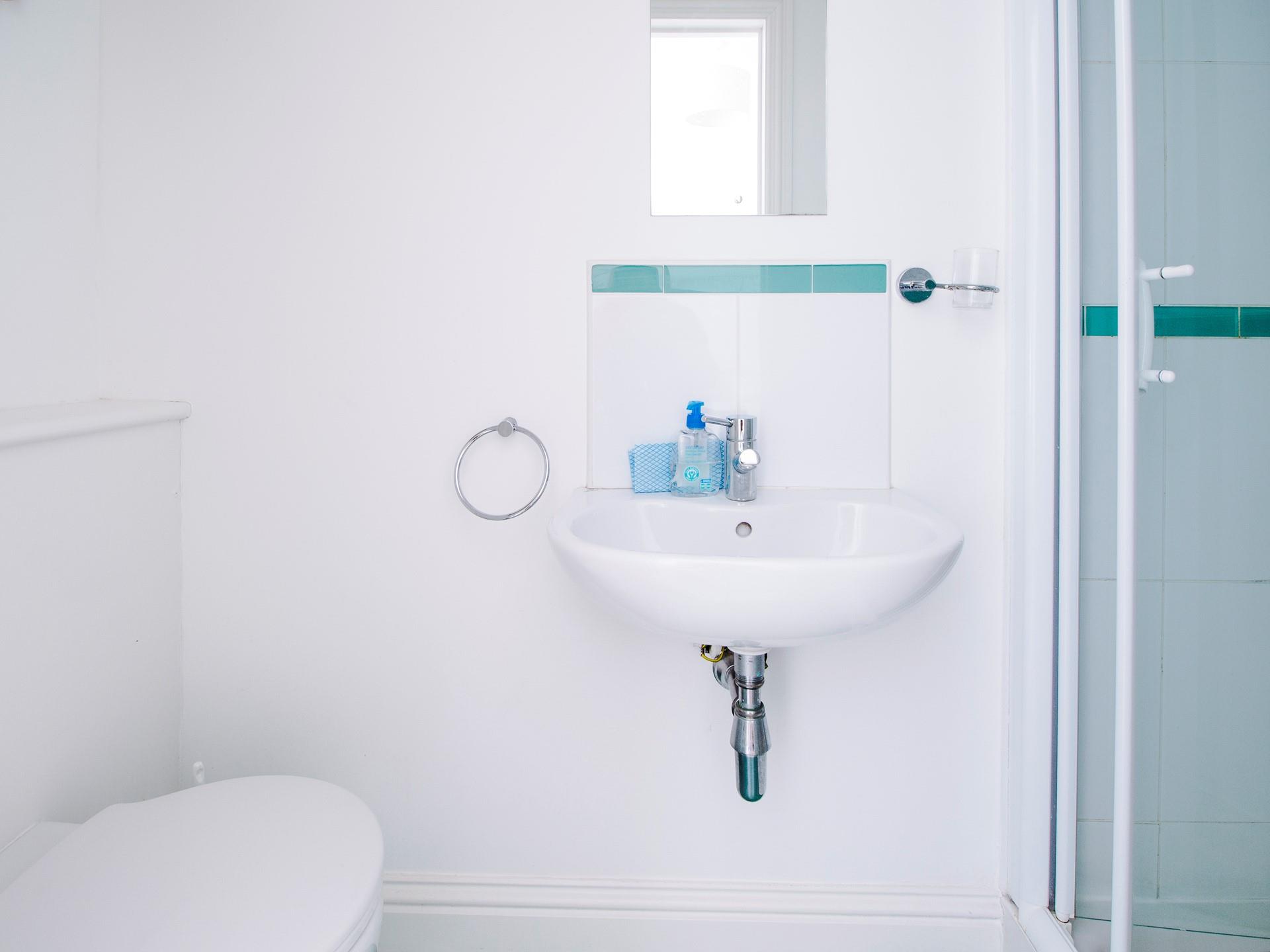 The en suite shower room is the perfect space to get ready in the morning.