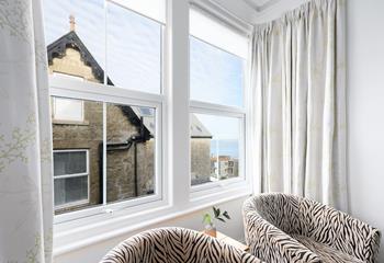 Sit in the window and get stuck into a good book with a sea view backdrop.
