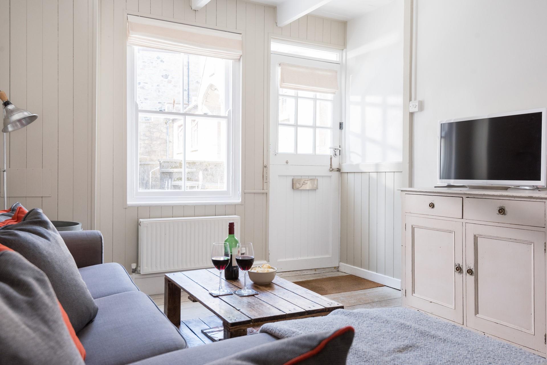 Sink into the sofa in the evening and enjoy a movie night.