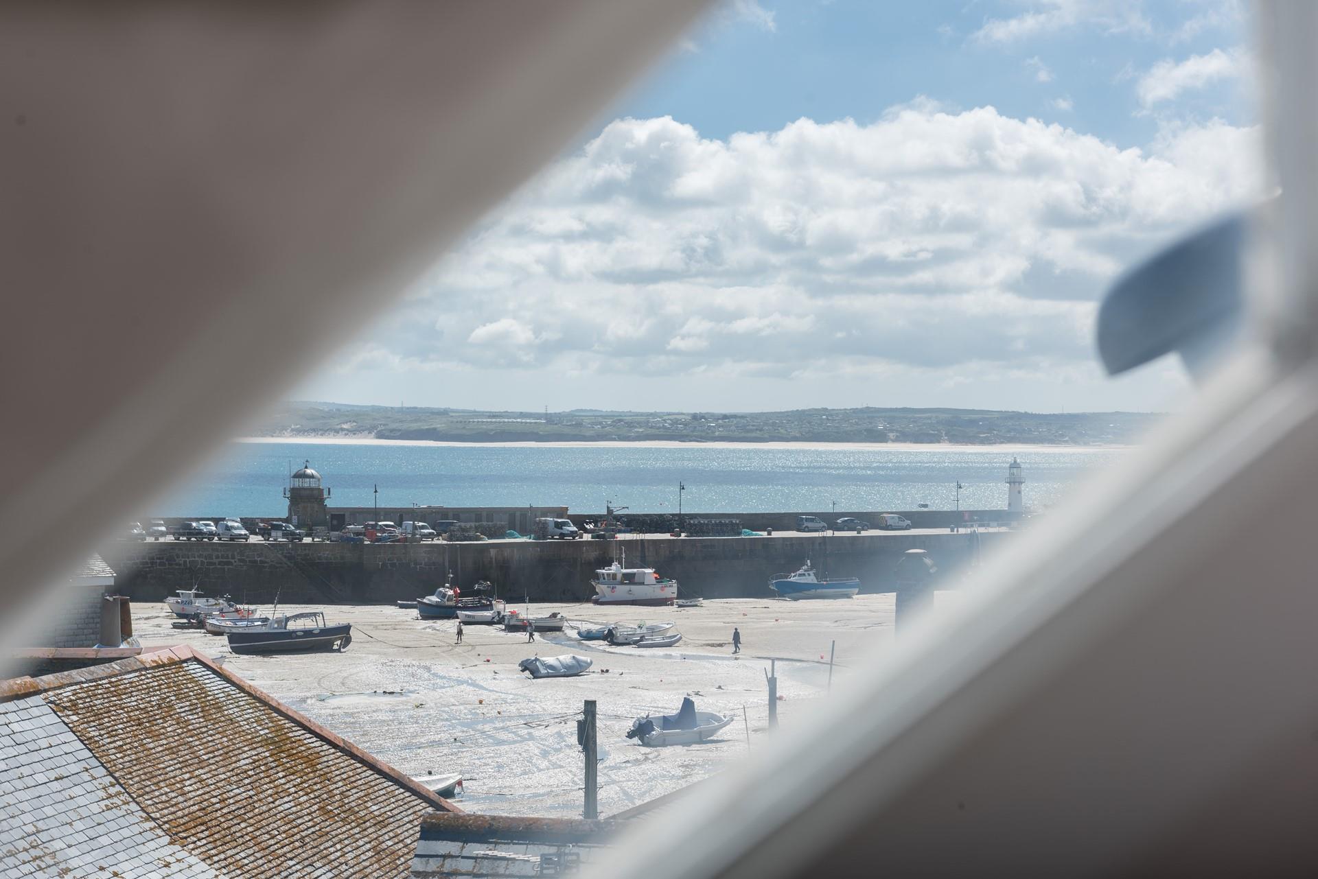 Bedroom 2 has views of the harbour to wake up to.