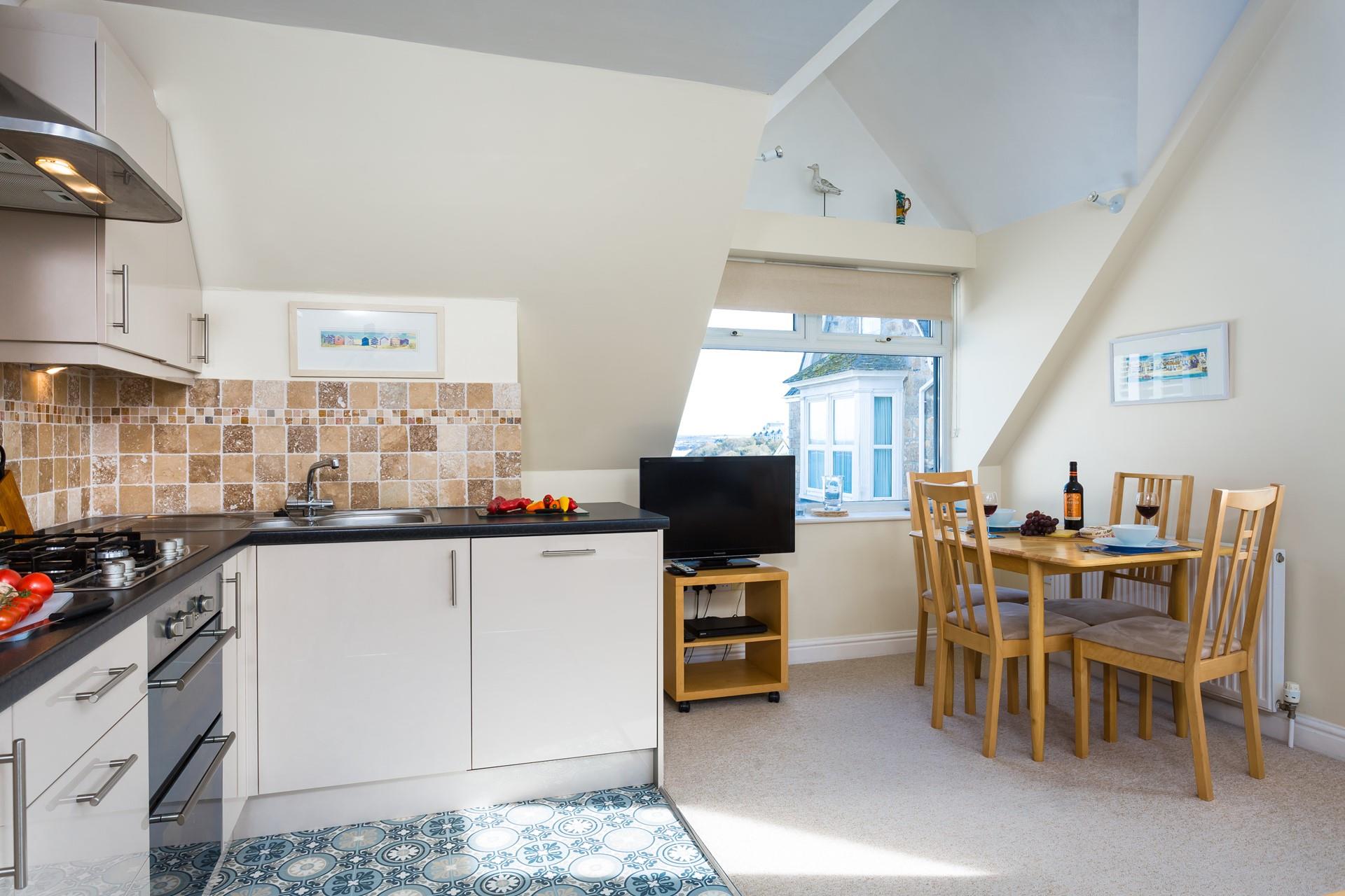 Cook up a storm in the well equipped kitchen.