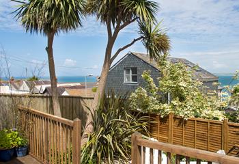 Sit on the balcony and enjoy a glass of something cold.