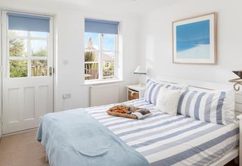 The double bedroom has access to the decking area.