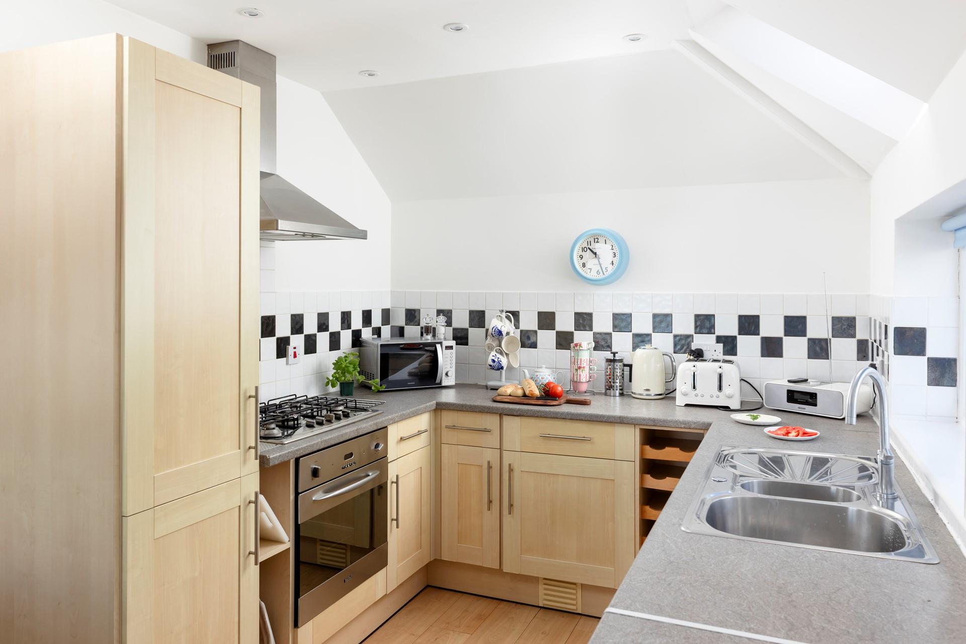 Cook up a storm in the well-equipped kitchen.