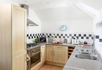Cook up a storm in the well-equipped kitchen.