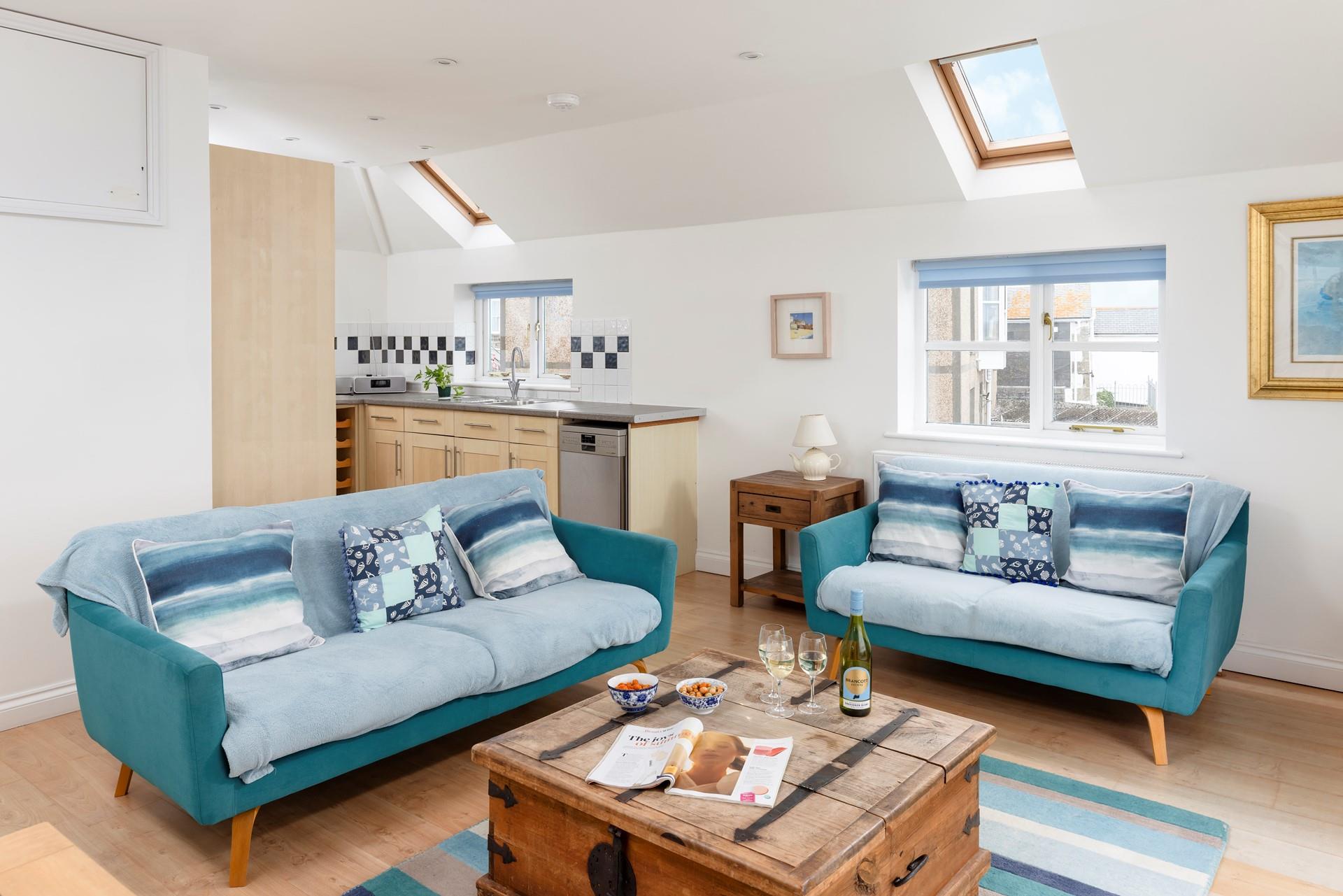 Relax with family and friends in the living area.