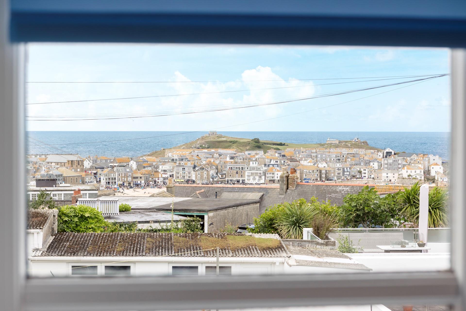 The views stretch across to the Island.