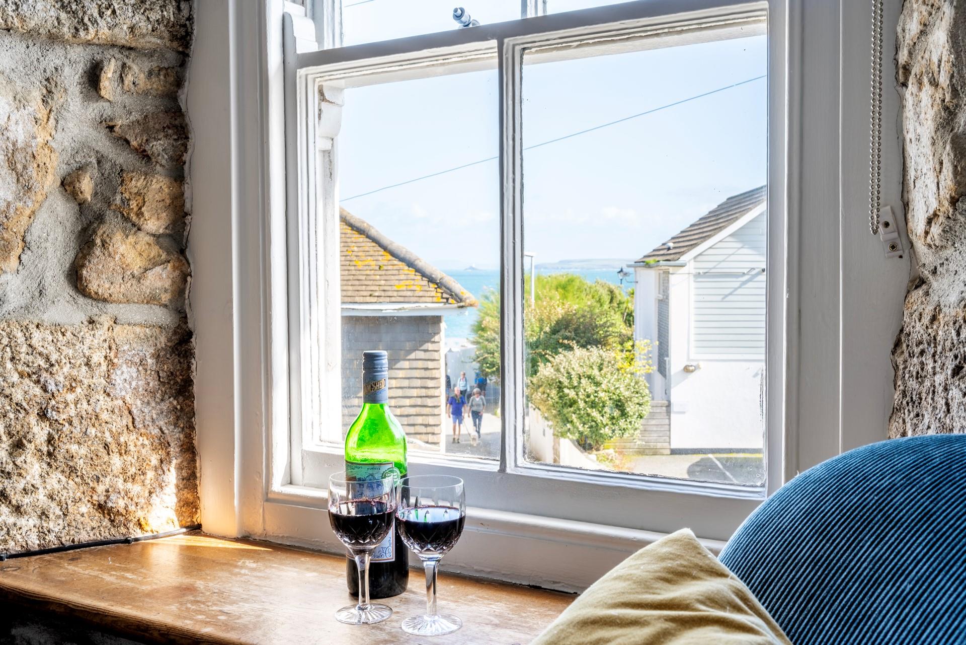 Sip a glass of wine after a day on the beach.