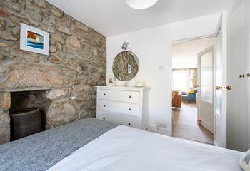 This lovely nautical bedroom reflects your seaside location.