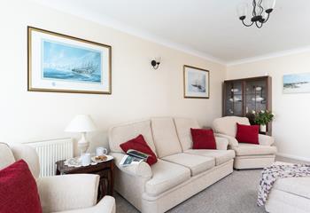 The comfortable sitting room is the perfect spot to grab an afternoon cup of tea and enjoy a good book.