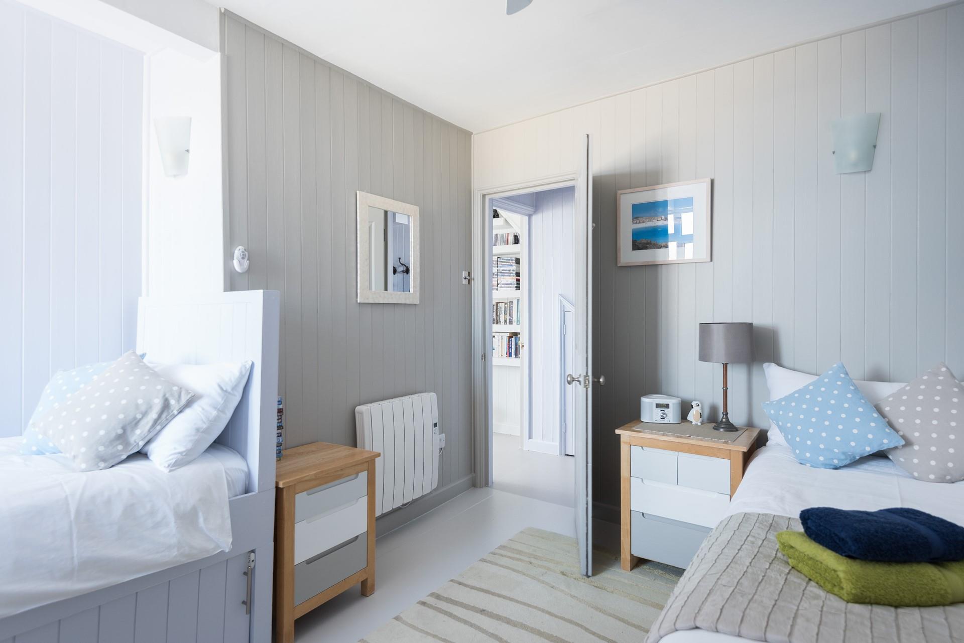 Bedroom 2 can cleverly be made up either as twin beds or a single and a king size bed. 