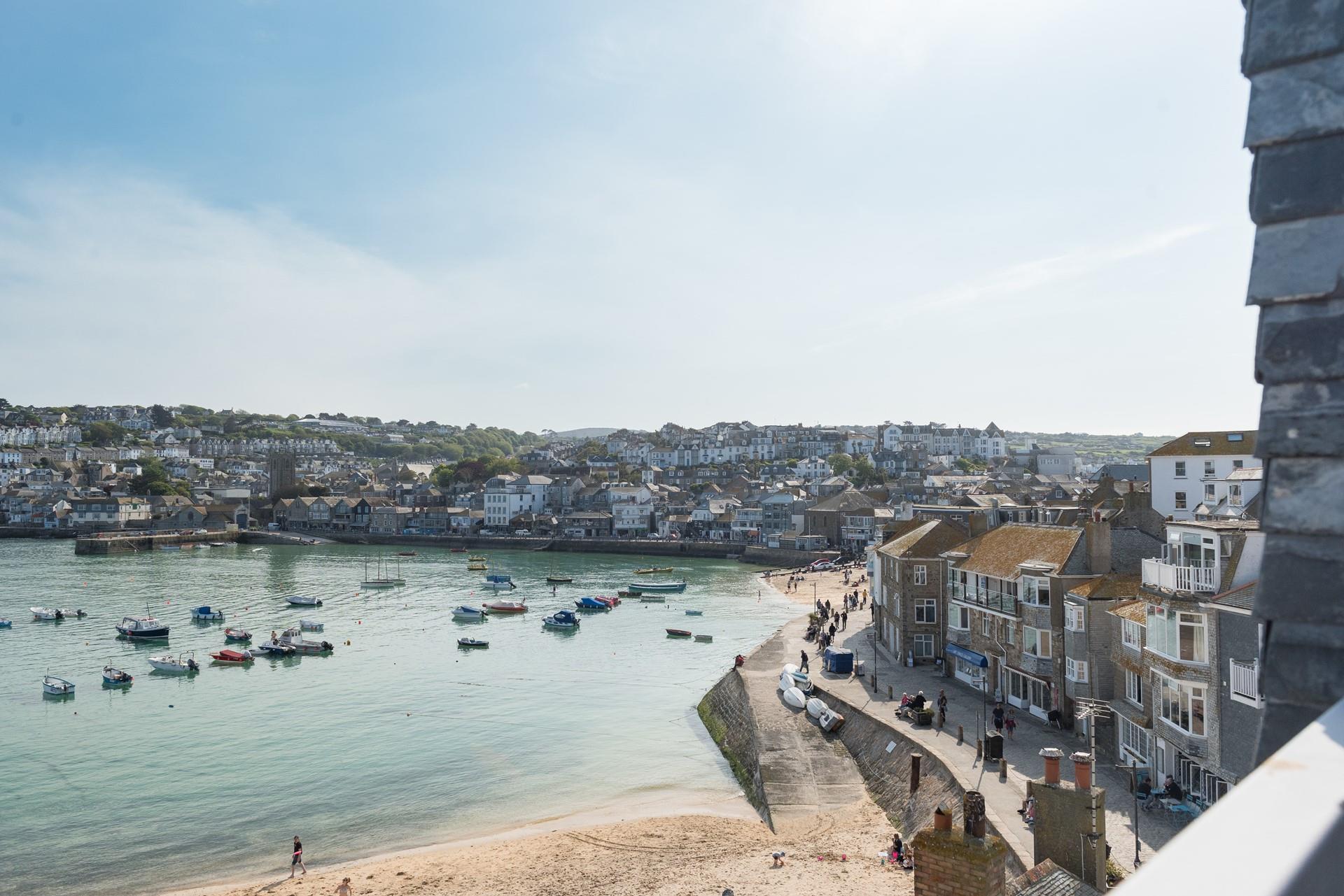 Watch the comings and goings of the harbour from your private balcony.