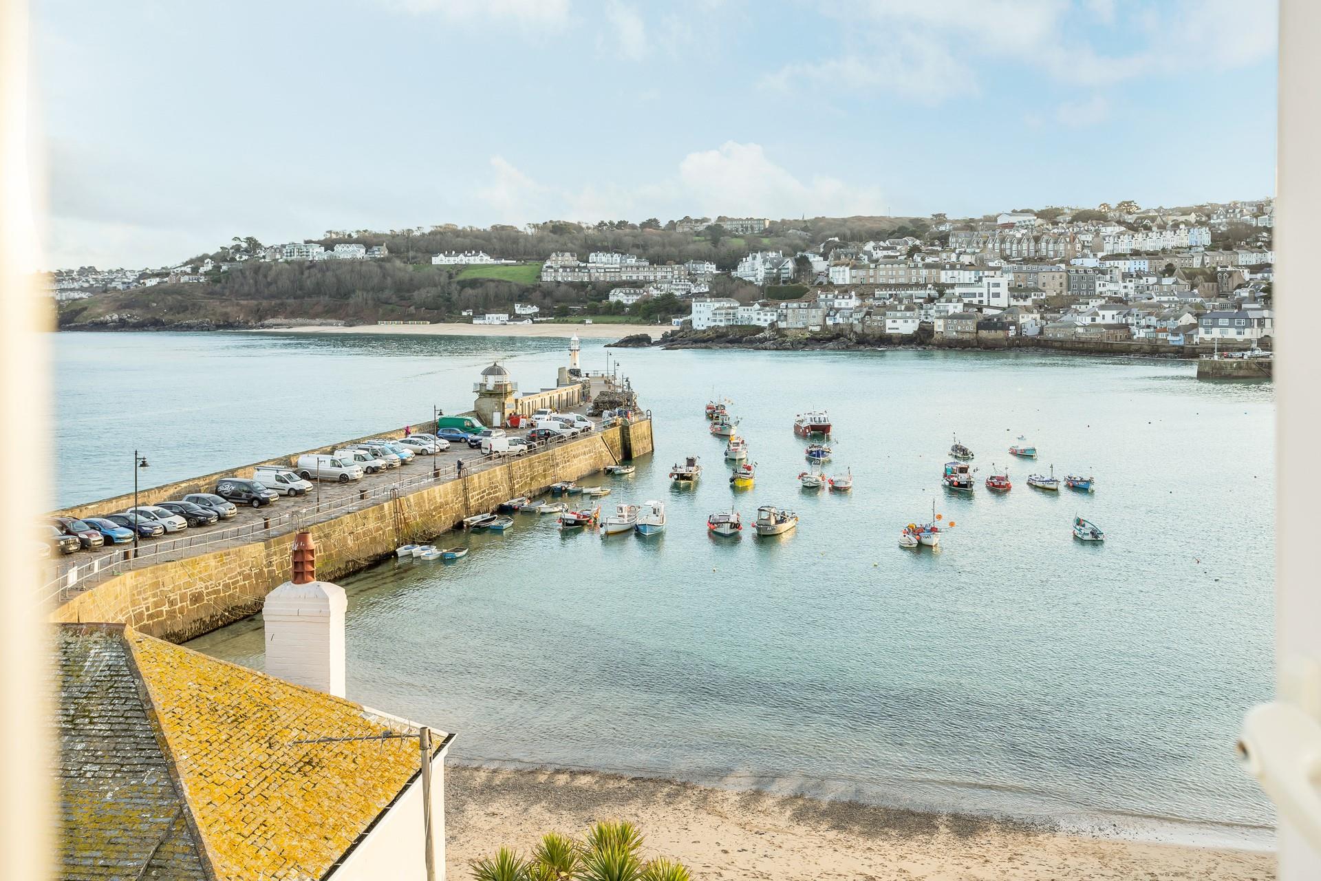 Watch the sun come down from the comfort of your apartment with a glass of something chilled in hand.