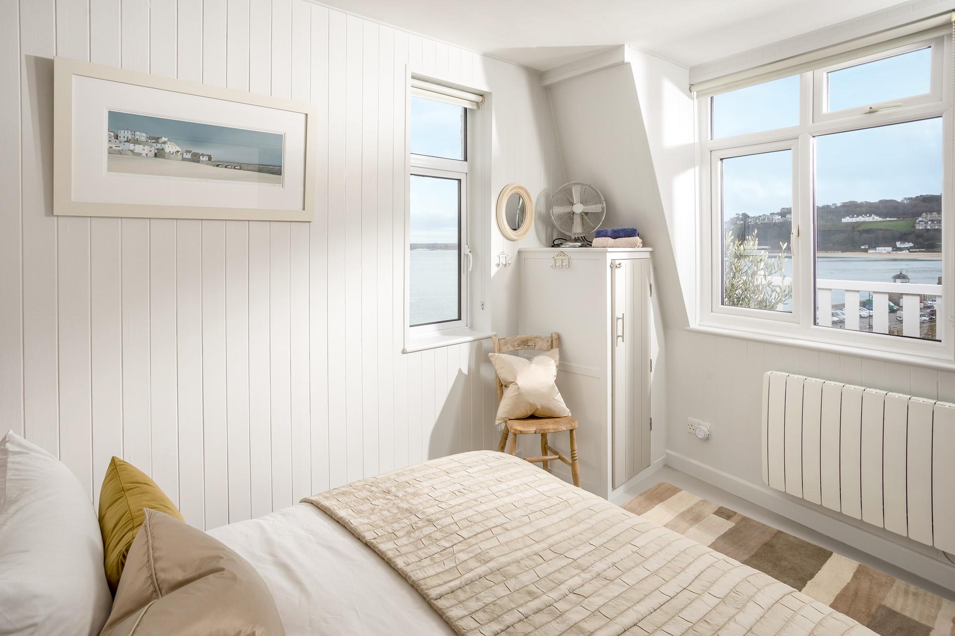 Beautifully bright, bedroom 1 benefits from dual aspect windows. 